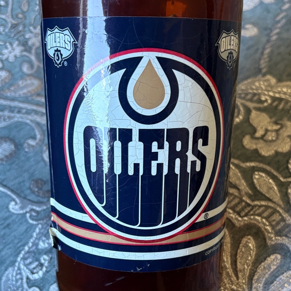 NHL Edmonton Oilers Brown Bottle with Gold Cap Coin Bank - Picture 6 of 7